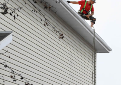 Photo of our roofer checking his work