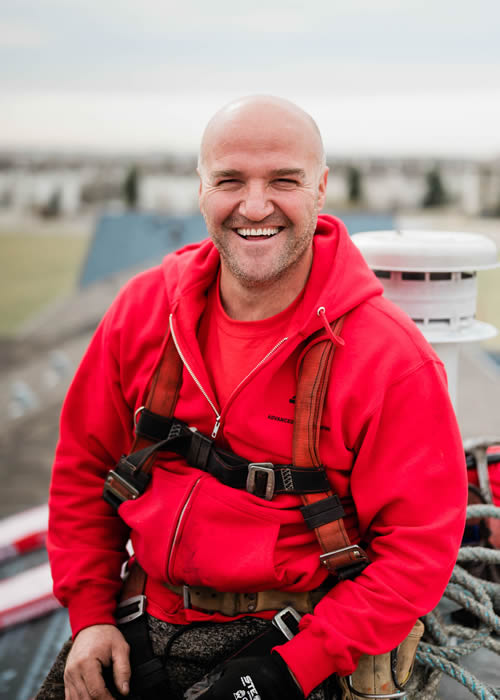 Headshot of our roofing foreman, Klaudian