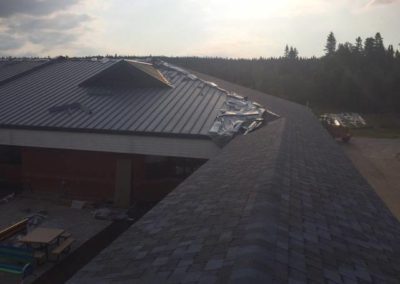 Photo of a commercial asphalt roof being installed in Calgary