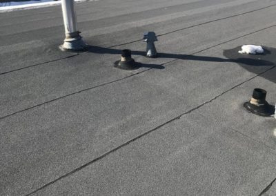 Photo of a flat roof in Calgary during the winter