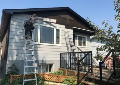 House having new siding installed