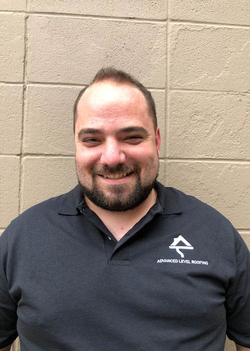 Headshot of our roofing estimator, Cory