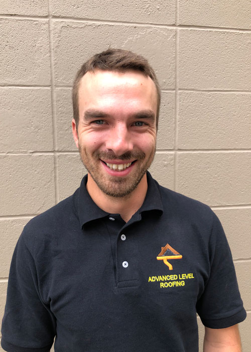Head shot of our roofing estimator, Will.