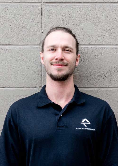 Head shot of our roofing estimator, Will.