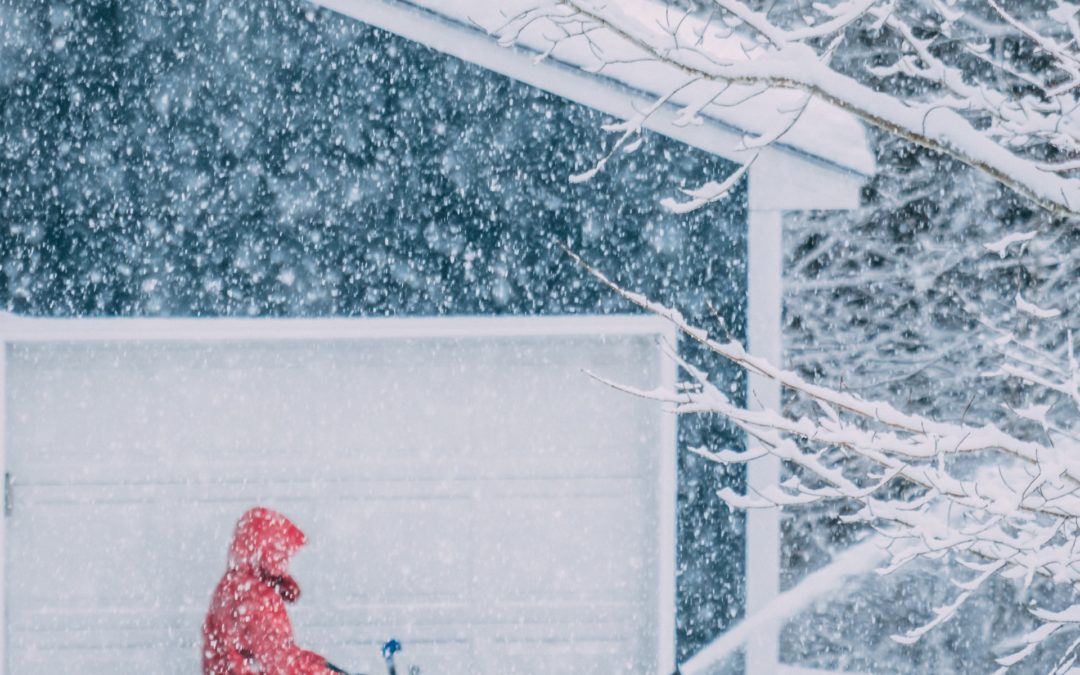 Man with snowblower