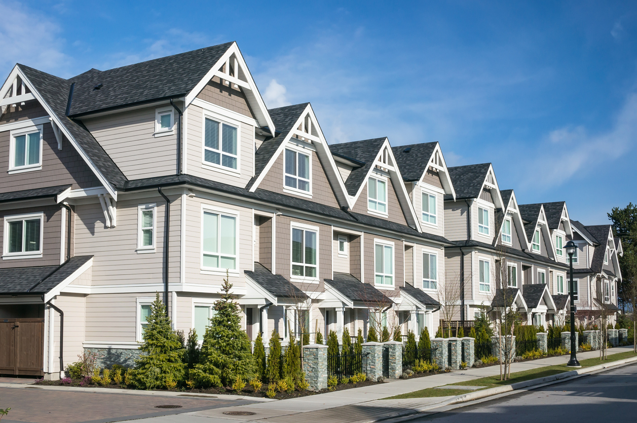 Modern townhouse complex Call Advanced Level Roofing today to learn more about multi-family roofing.