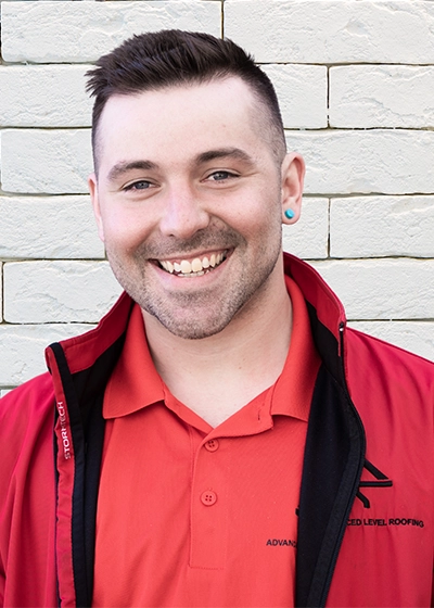 Head shot of our roofing estimator, Will.