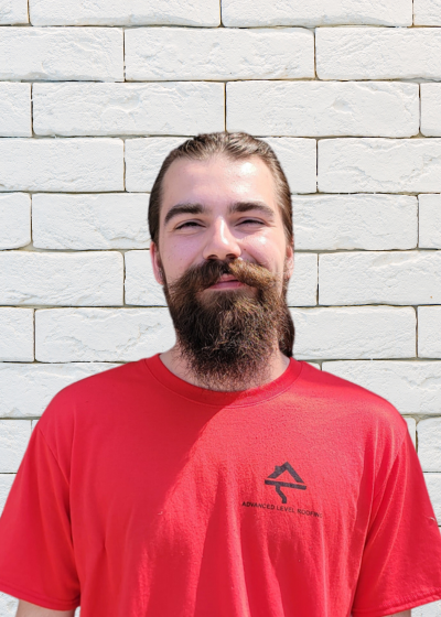 Head shot of our roofing estimator, Will.